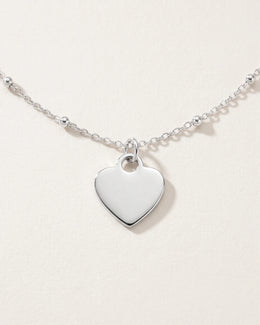 Halsband och armband med massivt hjärta berlock