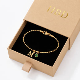 Bracelet personnalisé avec initiale et pierre de naissance en or 18 carats et argent sterling