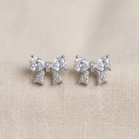 Bow Stud Earrings — Bow Studs Flatlay