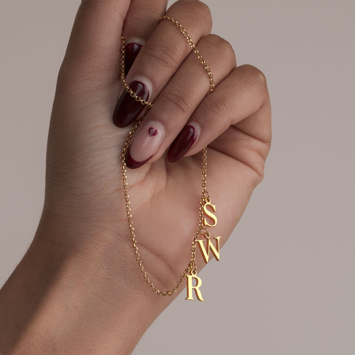 Collier à trois initiales