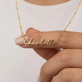 Necklace Charlotte Name Necklace HBD: Held, for scale