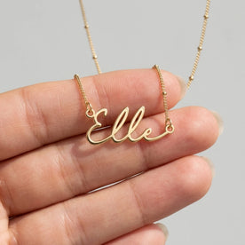 Necklace Elle Name Necklace HBD: Held, for scale