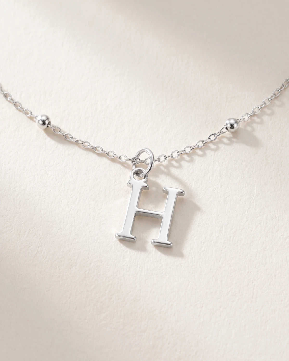 Free gift Letter H in silver on a satellite chain