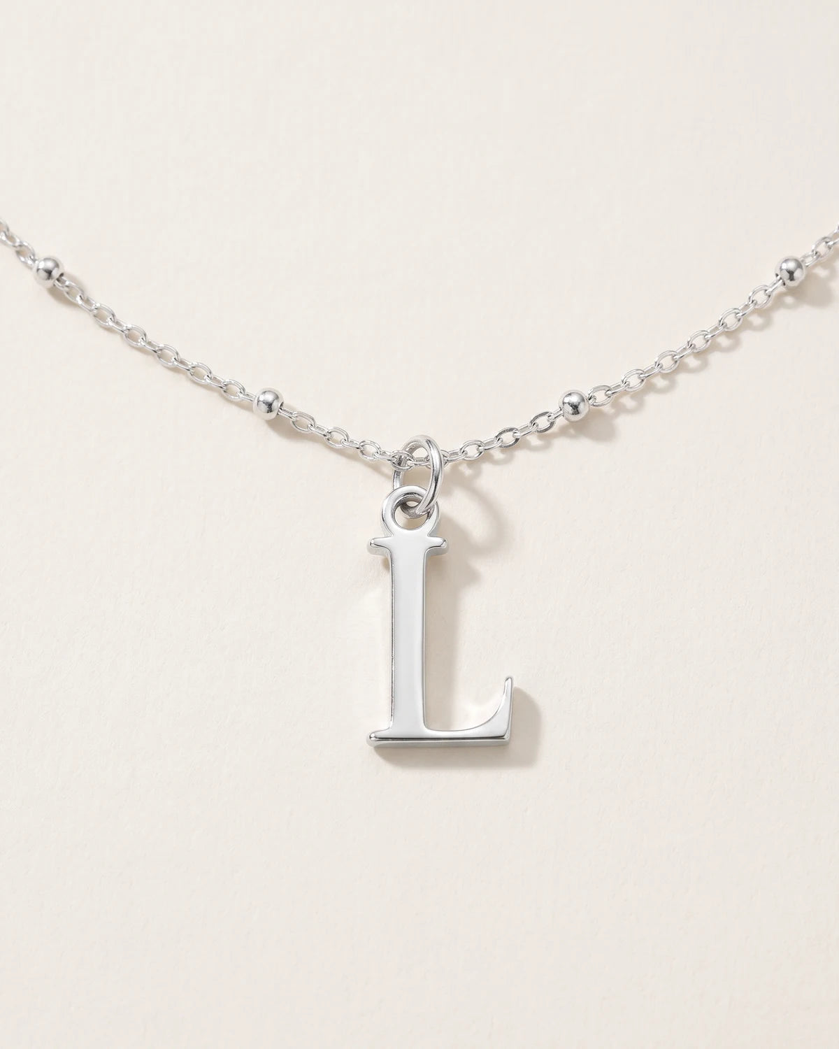 Free gift Letter L in silver on a satellite chain