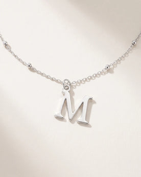 Free gift Letter M in silver on a satellite chain