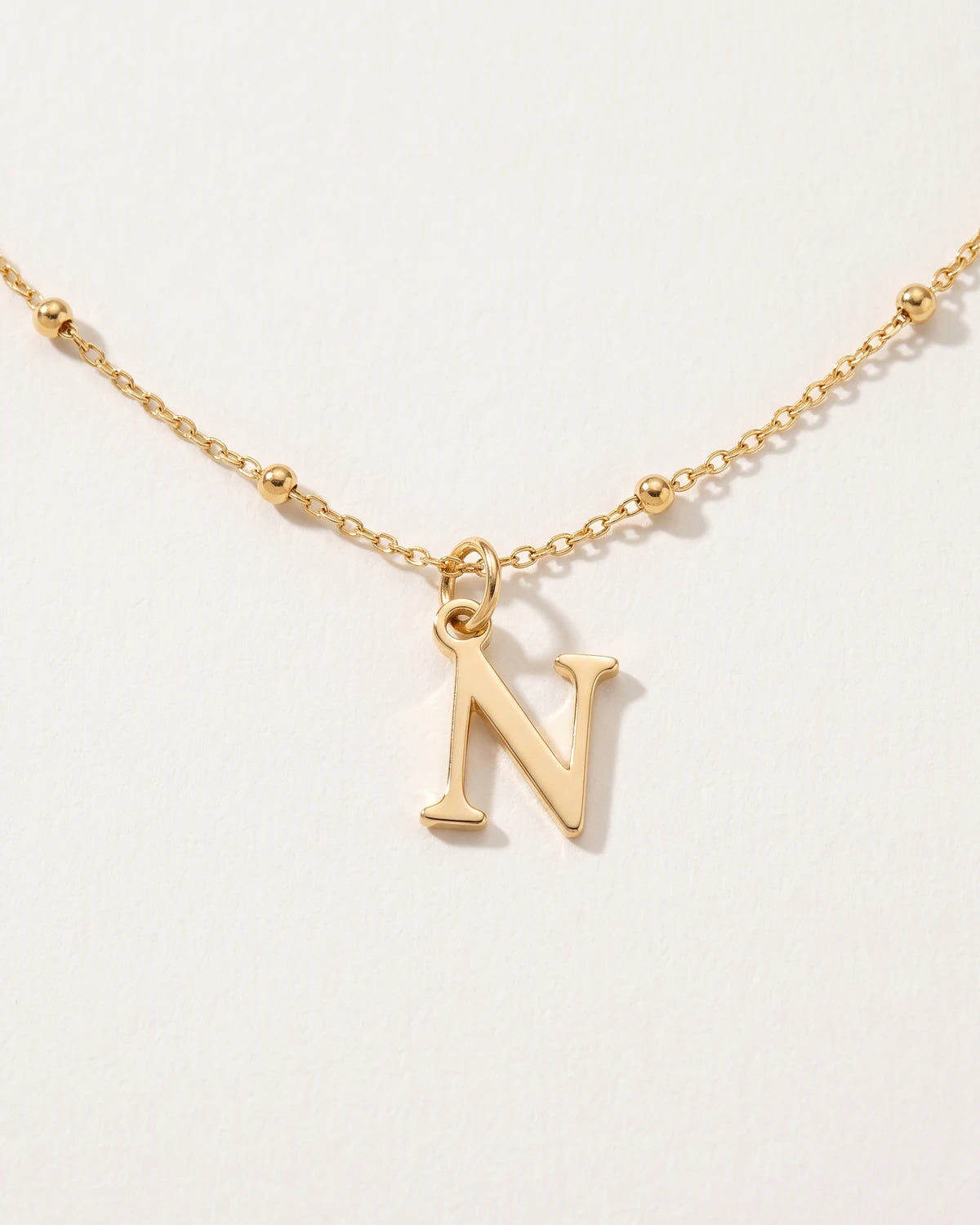 Free gift Letter N in gold on a satellite chain