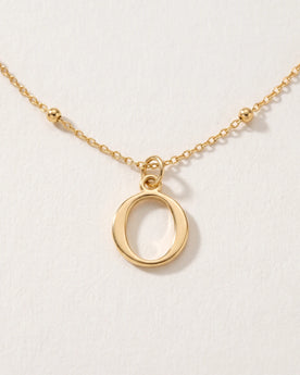 Free gift Letter O in gold on a satellite chain