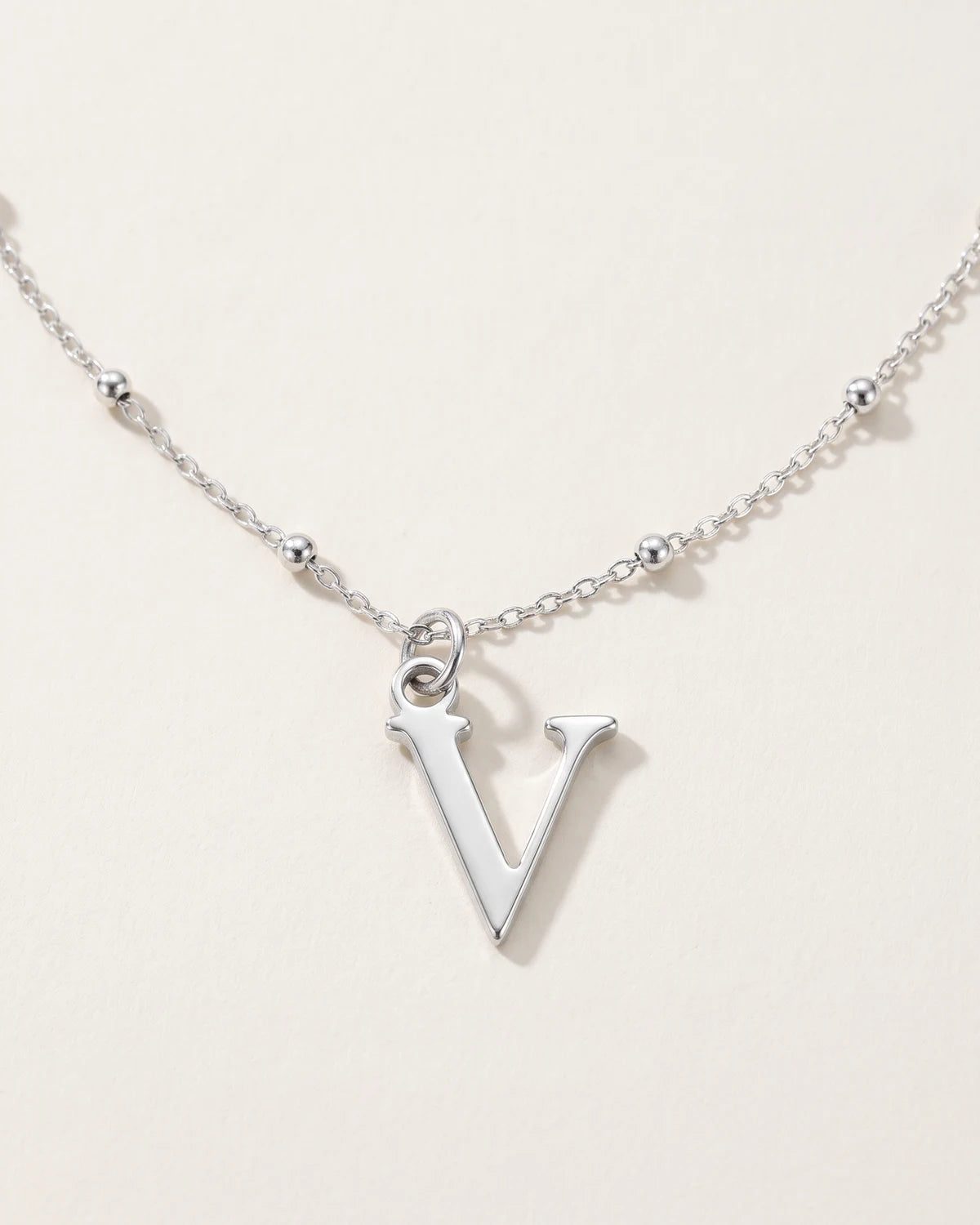 Free gift Letter V in silver on a satellite chain