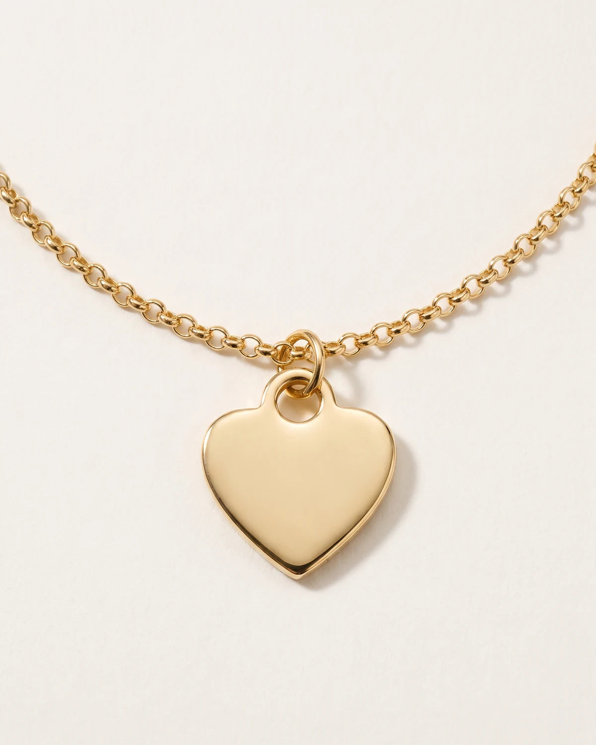 Halsband och armband med massivt hjärta berlock