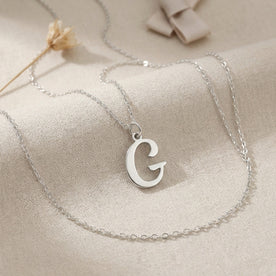 G-ketting | Hanger met initiaal en letter G, goud en zilver