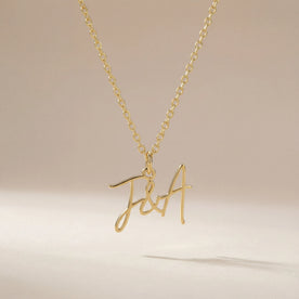 Collana personalizzata con doppia iniziale e e commerciale (&) – Oro e argento