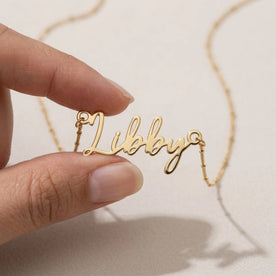 Necklace Libby Name Necklace HBD: Held, for scale