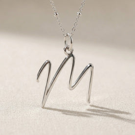 M-ketting | Hanger met initiaal en letter M, goud en zilver