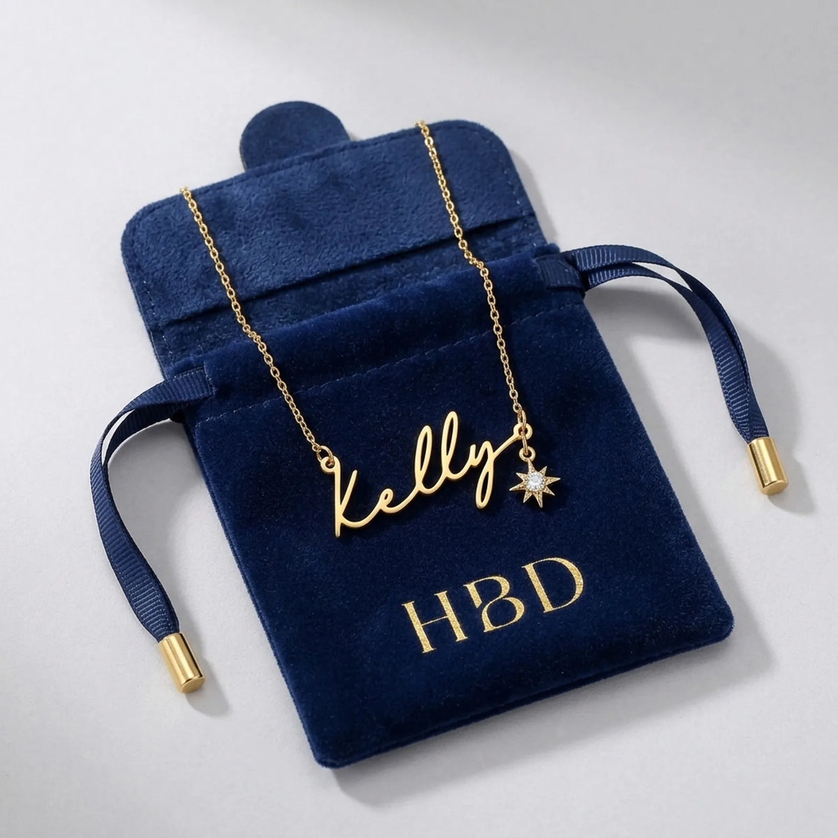 Namenskette mit Zirkonia-Sternanhänger in Gold und Silber