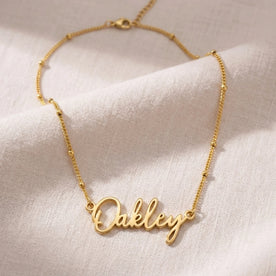 Collier prénom Oakley | Or 18 carats, argent et vermeil | Prêt à être expédié