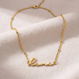 Kalung Nama Remi