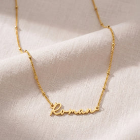 Kalung Nama Roman