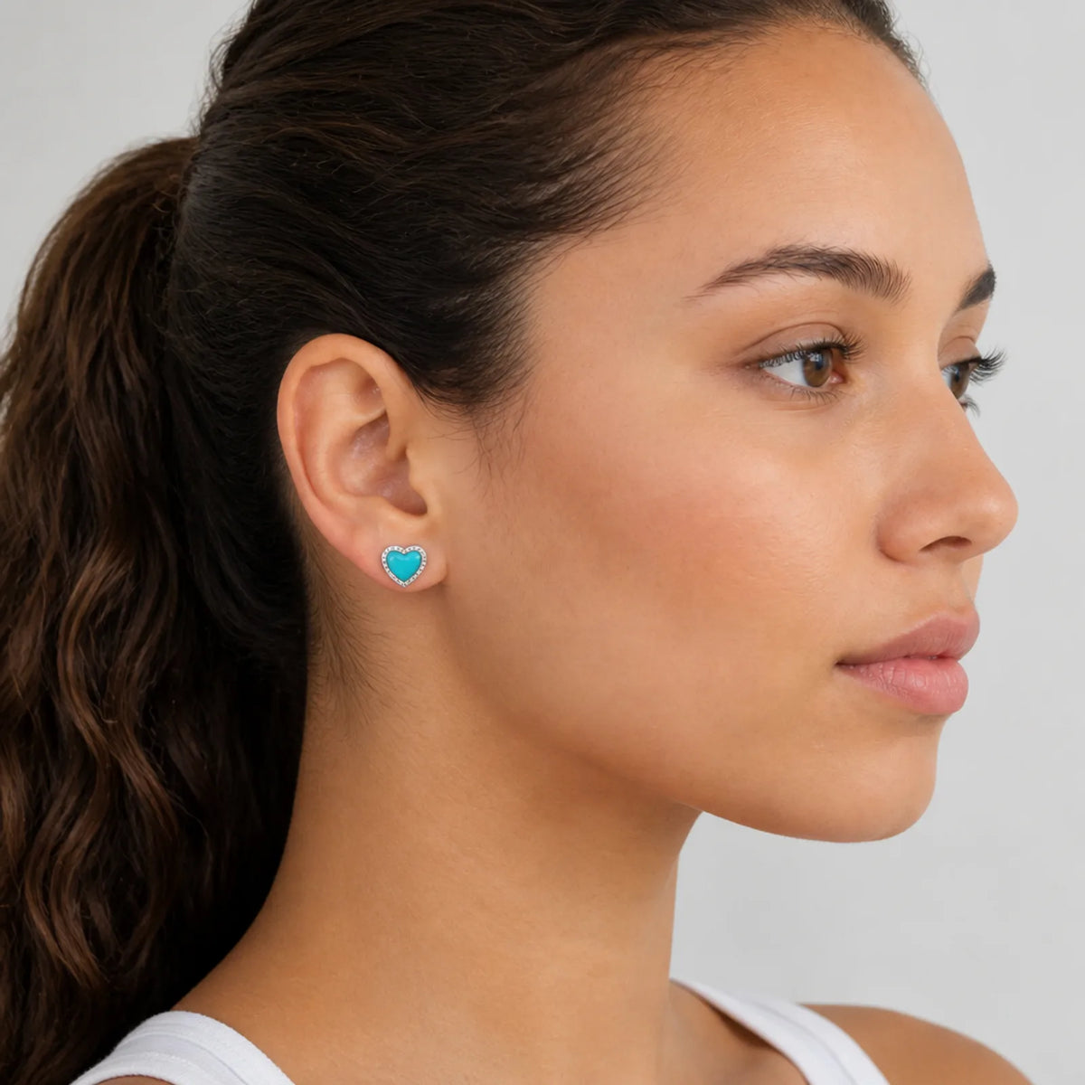 Turquoise Heart Studs — On the Ear